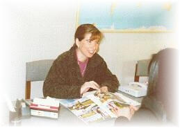 Paola the owner of this chillan travel agency of chile offering airline services and outdoor travel